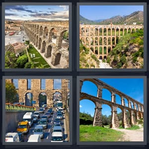 Segovia Spain wonder, tall archways for transport, road with congested traffic in Europe, water transportation system in ancient world