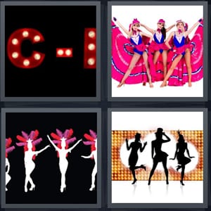lights for show Chicago, dancers with large pink dresses, Vegas showgirls with head pieces, women on stage with lights