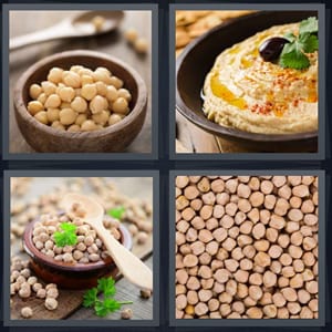 garbanzo beans, hummus with olive and cilantro, beans in wooden bowl, vegetables brown beans