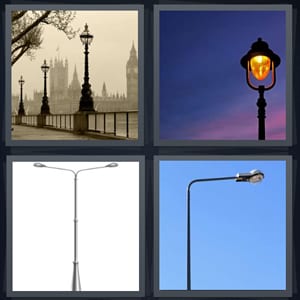 sidewalk along river in London, street light glowing orange at sunset, highway lights, lamp for street