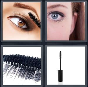 woman putting makeup on eyelashes, woman eye with makeup, black paint for lashes, brush for makeup