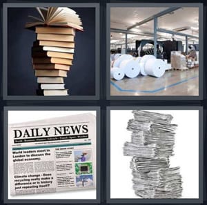 stack of old books, reams of large paper, daily news with columns, newspaper stacked