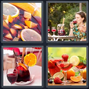 fruit in wine, woman drinking wine outside, drink in pitcher red, cocktail with fruit in fancy glasses
