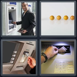 man using ATM, yellow marbles missing one, cash from machine, money being taken from ATM